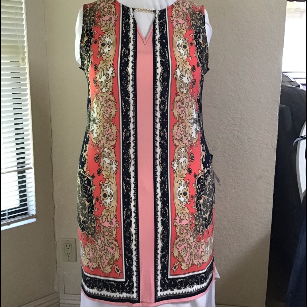 Lightweight stretch knit sleeveless dress.